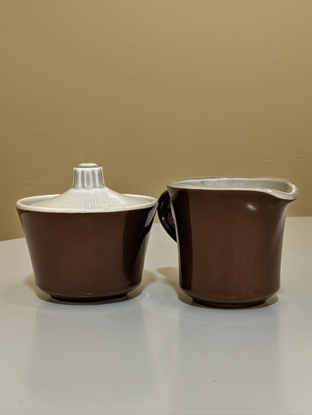 Brown Ceramic Creamer and Sugar Set with White Trim